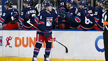 Apr 9, 2025; New York, New York, USA;  New York Rangers left wing J.T. Miller (8) celebrates his goal against the Philadelphia Flyers during the third period at Madison Square Garden. Mandatory Credit: Dennis Schneidler-Imagn Images