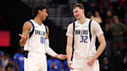 Nov 29, 2025; Inglewood, California, USA;  Dallas Mavericks guard Max Christie (00) and forward Cooper Flagg (32) chat during the fourth quarter against the Los Angeles Clippers at Intuit Dome. Mandatory Credit: Kiyoshi Mio-Imagn Images