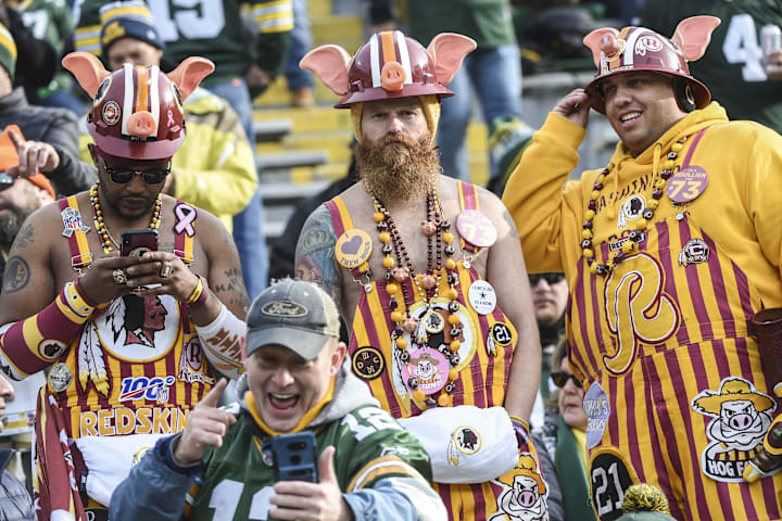Fans look on from the stands during warm ups prior to the game between the Washington Redskins and Green Bay Packers 