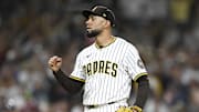 Sep 27, 2025; San Diego, California, USA; San Diego Padres relief pitcher Robert Suarez (75) pumps his fist after the Padres beat the Arizona Diamondbacks at Petco Park. Mandatory Credit: Denis Poroy-Imagn Images