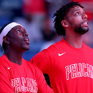 Oct 11, 2019; New Orleans, LA, USA; New Orleans Pelicans guard Jrue Holiday (11) and New Orleans Pelicans center Jahlil Okafor (8) watch a video before their game against the Utah Jazz at the Smoothie King Center. Mandatory Credit: Chuck Cook-Imagn Images