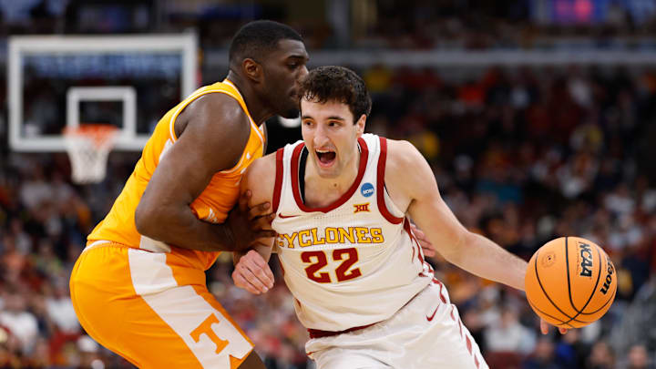 Mar 27, 2026; Chicago, IL, USA; Iowa State Cyclones forward Milan Momcilovic (22) drives the ball against Tennessee Volunteers forward Jaylen Carey (23) in the first half during a Sweet Sixteen game of the Midwest Regional of the men's 2026 NCAA Tournament at United Center.