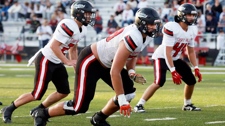 Ben Congdon rushes the passer from his defensive end spot during Tuscarawas Valley's 29-23 loss to Coshocton on Friday, Aug. 29, 2025, at Stewart Field in Coshocton, Ohio. Congdon, a 6-8, 300-pound senior, is committed to Miami (Fla.) as on offensive lineman.