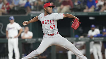 Sep 7, 2024; Arlington, Texas, USA; Los Angeles Angels relief pitcher Roansy Contreras (57) delivers against the Texas Rangers during the eighth inning at Globe Life Field. Mandatory Credit: Jim Cowsert-Imagn Images