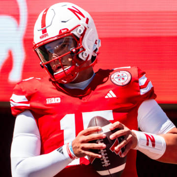 Aug 31, 2024; Lincoln, Nebraska, USA; Nebraska Cornhuskers quarterback Dylan Raiola (15) warms up before a game against the UTEP Miners at Memorial Stadium. 