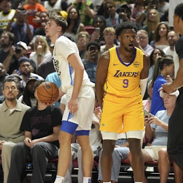 Jul 10, 2025; Las Vegas, NV, USA; Los Angeles Lakers guard Bronny James (9) reacts to a foul call against Dallas Mavericks forward Cooper Flagg (32) in the second quarter of their game at Thomas & Mack Center. Mandatory Credit: Candice Ward-Imagn Images