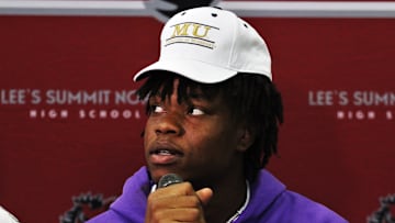 Five-star defensive lineman prospect Williams Nwaneri listens to a question from the media after committing to the university of Missouri on August 14, 2023, in Lee's Summit, Mo.