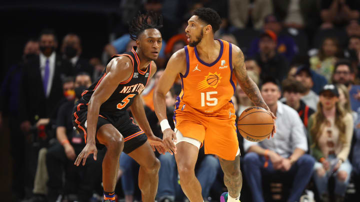 Mar 4, 2022; Phoenix, Arizona, USA; Phoenix Suns guard Cameron Payne (15) against New York Knicks guard Immanuel Quickley (5) at Footprint Center. Mandatory Credit: Mark J. Rebilas-USA TODAY Sports