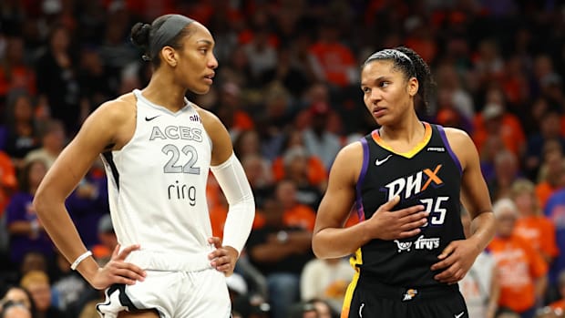 A photo of Alyssa Thomas next to A'ja Wilso