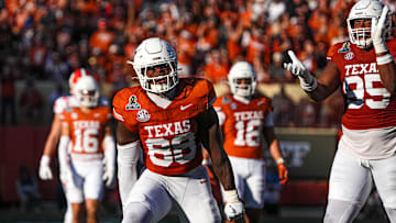 Texas Longhorns edge rusher Barryn Sorrell (88) celebrates a sack on Clemson quarterback Cade Klubnik (2) during the first round of the College Football Playoffs at Darrell K Royal-Texas Memorial Stadium on Saturday, Dec. 21, 2024.