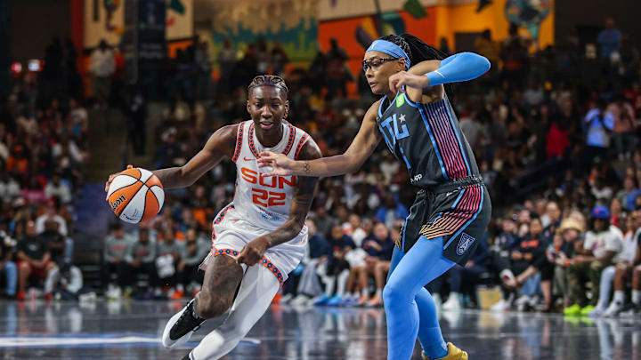 Sep 8, 2025; College Park, Georgia, USA; Connecticut Sun guard Saniya Rivers (22) drives the ball toward the basket against Atlanta Dream guard Allisha Gray (15) during the third quarter at Gateway Center Arena at College Park. Sep 8, 2025; College Park, Georgia, USA; Connecticut Sun guard Saniya Rivers (22) drives the ball toward the basket against Atlanta Dream guard Allisha Gray (15) during the third quarter at Gateway Center Arena at College Park.
