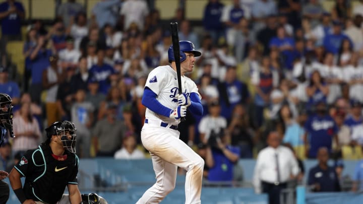 Los Angeles Dodgers first baseman Freddie Freeman (5) hits an RBI double during the ninth inning against the Arizona Diamondbacks at Dodger Stadium on July 2.