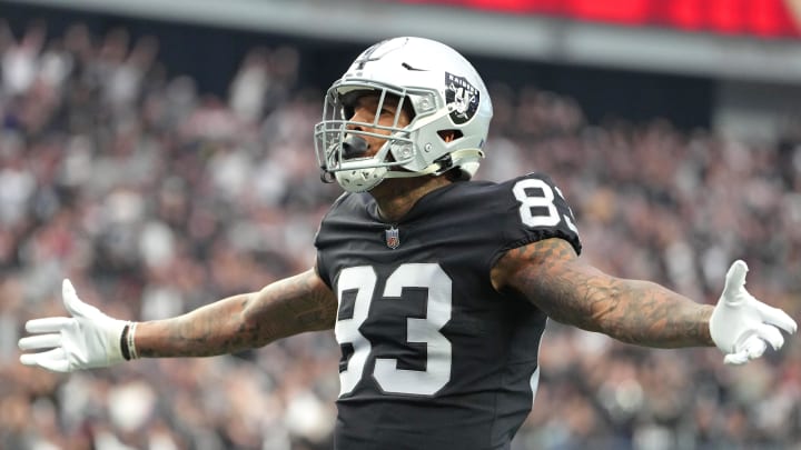 Dec 18, 2022; Paradise, Nevada, USA; Las Vegas Raiders tight end Darren Waller (83) celebrates after scoring a touchdown against the New England Patriots during the first half at Allegiant Stadium. Mandatory Credit: Stephen R. Sylvanie-USA TODAY Sports