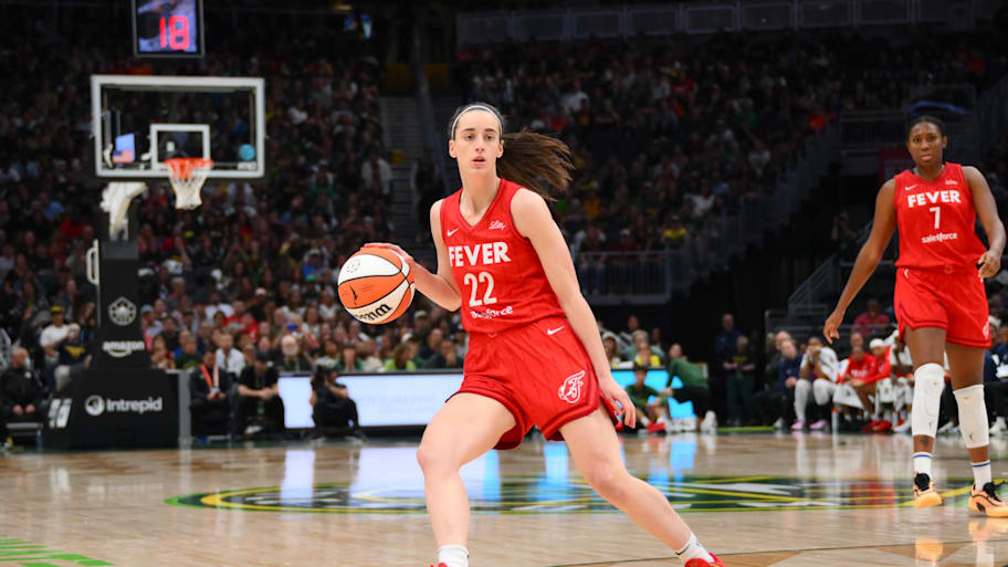 Caitlin Clark dribbles the ball against the Storm. | Steven Bisig-Imagn Images