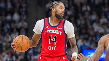 Nov 8, 2023; Minneapolis, Minnesota, USA; New Orleans Pelicans forward Brandon Ingram (14) dribbles against the Minnesota Timberwolves in the third quarter at Target Center.