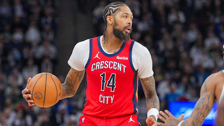 Nov 8, 2023; Minneapolis, Minnesota, USA; New Orleans Pelicans forward Brandon Ingram (14) dribbles against the Minnesota Timberwolves in the third quarter at Target Center.