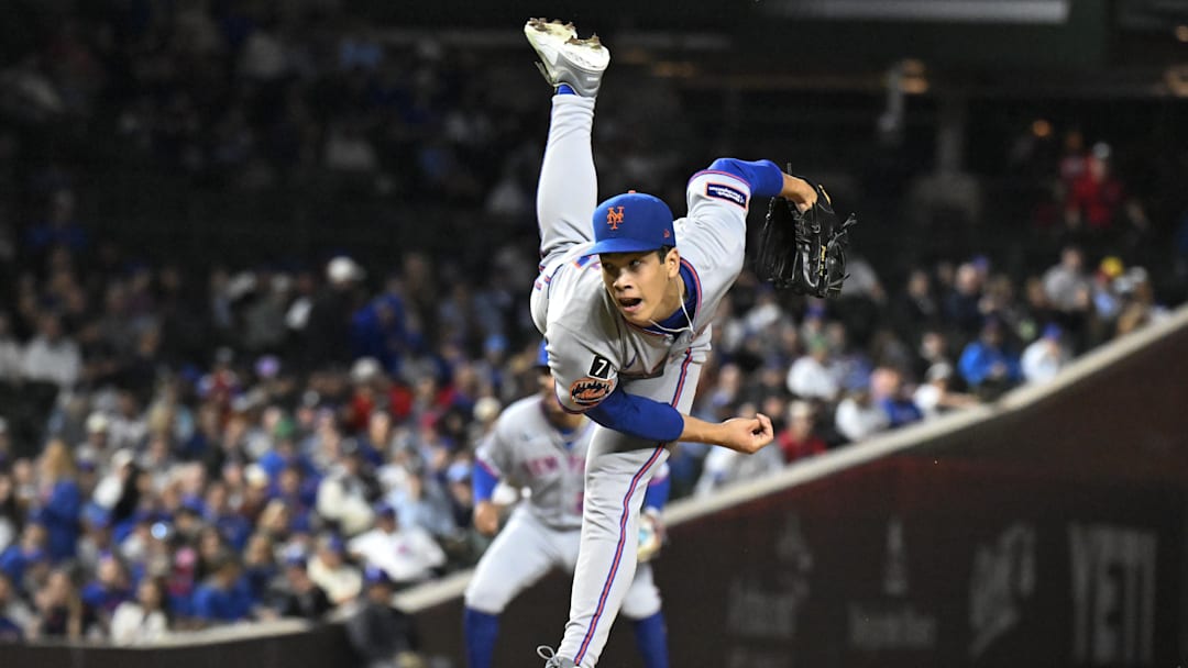 Sep 24, 2025; Chicago, Illinois, USA;  New York Mets pitcher Jonah Tong (21) throws pitch during the first inning against the Chicago Cubs at Wrigley Field. Mandatory Credit: Matt Marton-Imagn Images