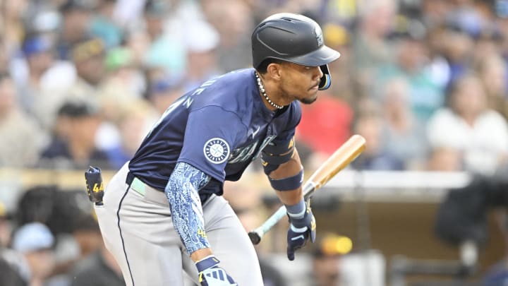 Seattle Mariners center fielder Julio Rodriguez (44) hits a single during the third inning against the San Diego Padres at Petco Park on June 9.