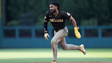 Jul 2, 2025; Philadelphia, Pennsylvania, USA; San Diego Padres outfielder Fernando Tatis Jr. (23) runs to third base on a throwing error during the fourth inning against the Philadelphia Phillies during the fourth inning at Citizens Bank Park. Mandatory Credit: Bill Streicher-Imagn Images