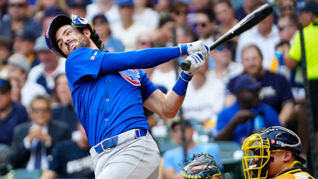 Dansby Swanson of Chicago Cubs in royal blue uniform