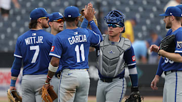 May 1, 2025; St. Petersburg, Florida, USA; Kansas City Royals shortstop Bobby Witt Jr. (7), third base Maikel Garcia (11), catcher Freddy Fermin (34) and teammates celebrate after they beat the Tampa Bay Rays  at George M. Steinbrenner Field. Mandatory Credit: Kim Klement Neitzel-Imagn Images