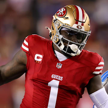 San Francisco 49ers receiver Deebo Samuel runs with the ball.