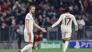 Michael Olise congratulates Harry Kane on making it 2-0