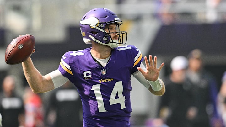 Sep 15, 2024; Minneapolis, Minnesota, USA; Minnesota Vikings quarterback Sam Darnold (14) throws a pass against the San Francisco 49ers during the first quarter U.S. Bank Stadium. Mandatory Credit: Jeffrey Becker-Imagn Images