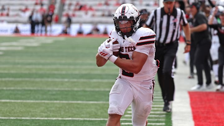 Sep 20, 2025; Salt Lake City, Utah, USA; Texas Tech Red Raiders running back Cameron Dickey (8) runs for a touchdown against the Utah Utes during the fourth quarter at Rice-Eccles Stadium. Mandatory Credit: Rob Gray-Imagn Images