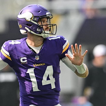 Sep 15, 2024; Minneapolis, Minnesota, USA; Minnesota Vikings quarterback Sam Darnold (14) throws a pass against the San Francisco 49ers during the first quarter U.S. Bank Stadium.