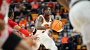 Feb 15, 2025; Stillwater, Oklahoma, USA; Oklahoma State Cowboys guard Arturo Dean (2) passes the ball during the first half against the Texas Tech Red Raiders at Gallagher-Iba Arena. Mandatory Credit: William Purnell-Imagn Images