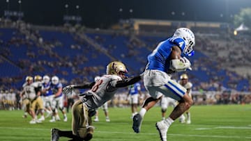 Eli Pancol with a touchdown grab against Elon. 