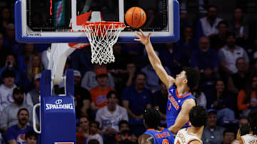 Jan 18, 2025; Gainesville, Florida, USA; Florida Gators guard Walter Clayton Jr. (1) makes a layup against the Texas Longhorns during the first half at Exactech Arena at the Stephen C. O'Connell Center. Mandatory Credit: Matt Pendleton-Imagn Images