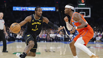 Nov 11, 2025; Oklahoma City, Oklahoma, USA; Golden State Warriors forward Jonathan Kuminga (1) moves the ball down the court beside Oklahoma City Thunder guard Shai Gilgeous-Alexander (2) during the second half at Paycom Center. Mandatory Credit: Alonzo Adams-Imagn Images