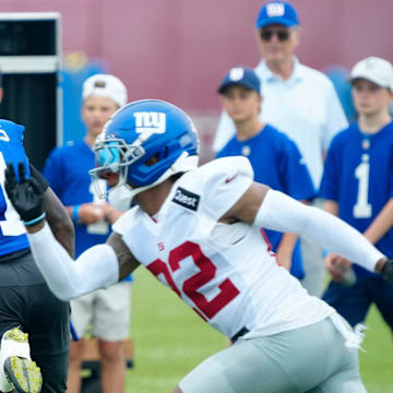 New York Giants wide receiver Malik Nabers (1) and New York Giants cornerback Dru Phillips (22).