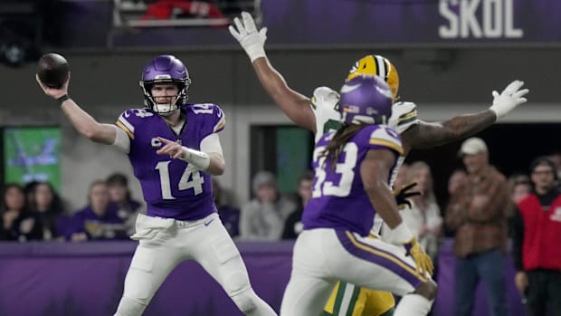 Minnesota Vikings quarterback Sam Darnold (14) throws a pass during their big win over the Green Bay Packers.