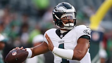 Philadelphia Eagles quarterback Jalen Hurts (1) throws the ball as he warms up before a game against the Cincinnati Bengals