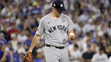 Oct 26, 2024; Los Angeles, California, USA; New York Yankees pitcher Carlos Rodon (55) reacts in the third inning against the Los Angeles Dodgers during game two of the 2024 MLB World Series at Dodger Stadium. Mandatory Credit: Jayne Kamin-Oncea-Imagn Images