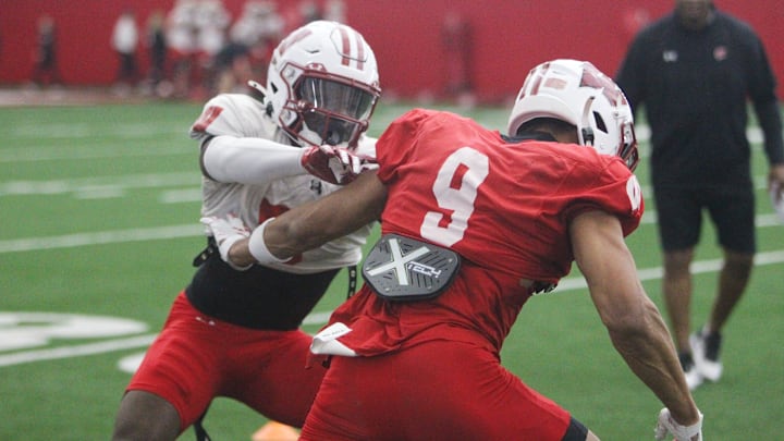 Wisconsin cornerback RJ Delancy (left) battles receiver Bryson Green during practice on Tuesday April 9, 2024 at the McClain Center in Madison, Wisconsin.