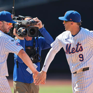 Jul 11, 2024; New York City, New York, USA; New York Mets first baseman Pete Alonso (20) and left fielder Brandon Nimmo (9) celebrate after defeating the Washington Nationals at Citi Field. Mandatory Credit: Vincent Carchietta-USA TODAY Sports