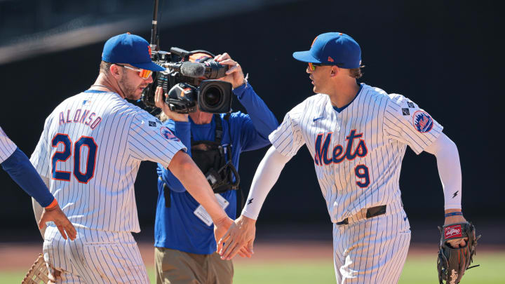 Jul 11, 2024; New York City, New York, USA; New York Mets first baseman Pete Alonso (20) and left fielder Brandon Nimmo (9) celebrate after defeating the Washington Nationals at Citi Field. Mandatory Credit: Vincent Carchietta-USA TODAY Sports