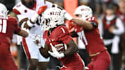 Sep 6, 2025; Pullman, Washington, USA; Washington State Cougars running back Angel Johnson (1) carries the ball against the San Diego State Aztecs in the first half at Gesa Field at Martin Stadium. Mandatory Credit: James Snook-Imagn Images