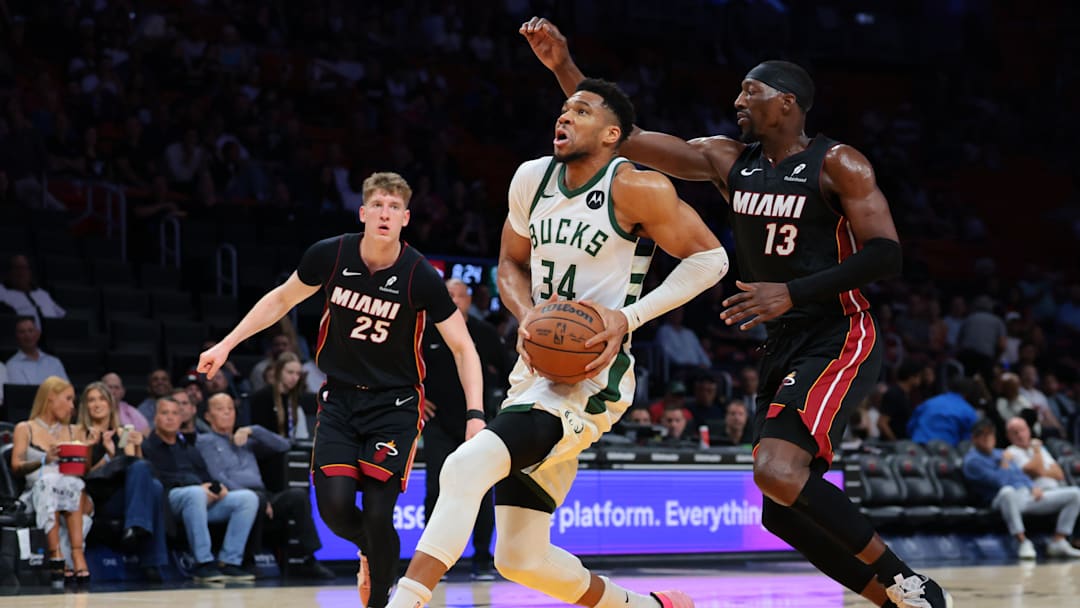 Mar 11, 2026; Miami, FL, United States; Milwaukee Bucks forward Giannis Antetokounmpo (34) drives to the basket against Miami Heat center Bam Adebayo (13) during the first quarter at loanDepot Park. Mandatory Credit: Sam Navarro-Imagn Images Mar 11, 2026; Miami, FL, United States; Milwaukee Bucks forward Giannis Antetokounmpo (34) drives to the basket against Miami Heat center Bam Adebayo (13) during the first quarter at loanDepot Park. Mandatory Credit: Sam Navarro-Imagn Images