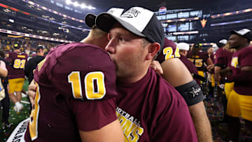 Arizona State QB Sam Leavitt and head coach Kenny Dillingham celebrate the Sun Devils' 45-19 victory over Iowa State in the Big 12 Conference championship game Saturday, Dec. 7, 2024.