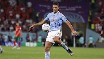 Dec 6, 2022; Ar Rayyan, QATAR; Spain midfielder Rodri (16) controls the ball against Morocco during the second half in the round of sixteen match of the 2022 FIFA World Cup at Education City Stadium. Mandatory Credit: Yukihito Taguchi-Imagn Images