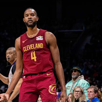 Mar 7, 2025; Charlotte, North Carolina, USA; Cleveland Cavaliers forward Evan Mobley (4) celebrates a three point basket against the Charlotte Hornets during the fourth quarter at Spectrum Center. Mandatory Credit: Scott Kinser-Imagn Images