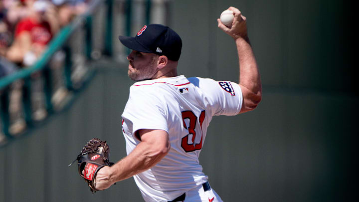 Mar 2, 2025; Fort Myers, Florida, USA; Boston Red Sox Liam Hendriks (31) pitching during the third inning of their game with the New York Mets at JetBlue Park at Fenway South. Mandatory Credit: Chris Tilley-Imagn Images