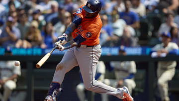 Jul 21, 2024; Seattle, Washington, USA; Houston Astros designated hitter Yordan Alvarez (44) hits a double against the Seattle Mariners during the eighth inning at T-Mobile Park. Mandatory Credit: John Froschauer-USA TODAY Sports