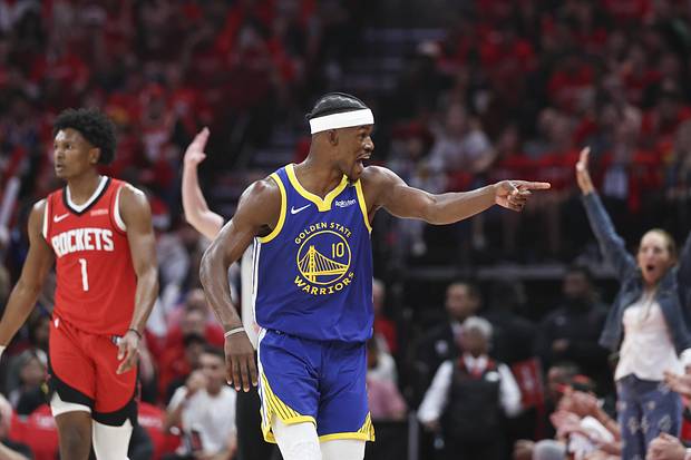 Golden State Warriors forward Jimmy Butler III reacts towards the crowd. 