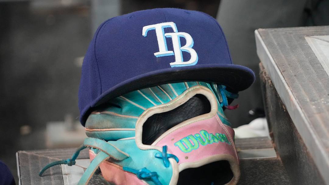 Sep 26, 2025; Toronto, Ontario, CAN; The hat and glove of Tampa Bay Rays third baseman Junior Caminero (13) in the dugout during the game against the Toronto Blue Jays at Rogers Centre. Mandatory Credit: John E. Sokolowski-Imagn Images Sep 26, 2025; Toronto, Ontario, CAN; The hat and glove of Tampa Bay Rays third baseman Junior Caminero (13) in the dugout during the game against the Toronto Blue Jays at Rogers Centre. Mandatory Credit: John E. Sokolowski-Imagn Images